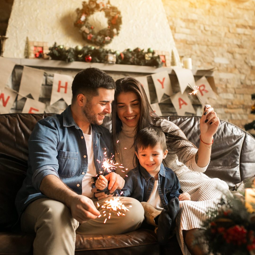 family on christmas with bengal lights